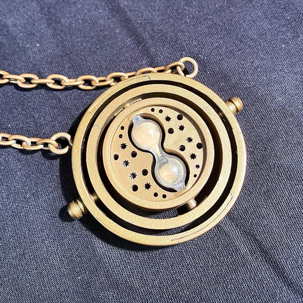 Hermione Granger's Time Turner Harry Potter Spinning Gold Tone Plastic Necklace